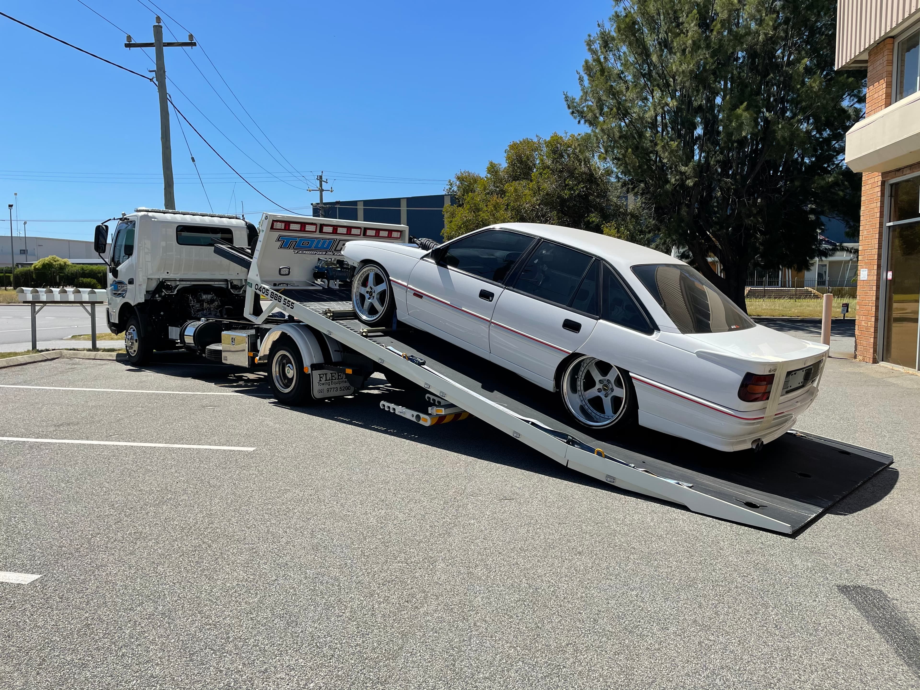 Classic car loading onto Tow Rite flatbed tilt-tray — 24/7 towing Perth